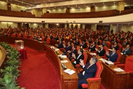 Các đồng chí Ủy viên Ban Chấp hành Trung ương khóa XIII dự Hội nghị lần thứ nhất Ban Chấp hành Trung ương Đảng Cộng sản Việt Nam khóa XIII. (Ảnh: Trí Dũng/TTXVN)