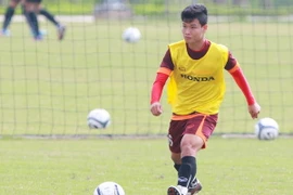 Trần Hữu Đông Triều cũng mong muốn được ra nước ngoài thi đấu như Tuấn Anh, Công Phượng. (Ảnh: Minh Chiến/Vietnam+)