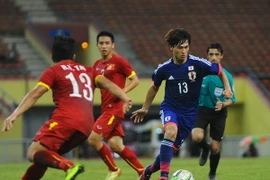 U23 Nhật Bản (áo xanh) là "thuốc thử" rất tốt cho U23 Việt Nam trước vòng chung kết. (Ảnh: Đỗ Đen/Vietnam+)