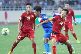 Đội tuyển Philippines (áo xanh) từng thua 0-3 trước Việt Nam hồi năm ngoái. (Ảnh: Minh Chiến/Vietnam+)