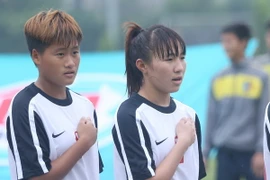 Lê Thị Thu (số 2) trong đội hình tuyển nữ Việt Nam dự vòng loại giải U19 châu Á 2014. (Ảnh: Minh Chiến/Vietnam+)