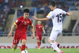 Đội tuyển Việt Nam thăng bậc nhờ chơi tốt trước Iraq. (Ảnh: Minh Chiến/Vietnam+)