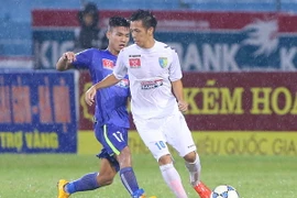 Văn Quyết (10) thi đấu cực hay trong màu áo Hà Nội T&T với 9 bàn sau 16 vòng tại V-League. (Ảnh: Minh Chiến/Vietnam+)