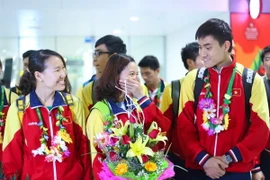 Ba kiếm thủ xuất sắc nhất của đấu kiếm Việt Nam (từ trái qua phải) Trần Thị Len, Nguyễn Thị Lệ Dung và Vũ Thành An - những người đã giành huy chương vàng SEA Games. (Ảnh: Minh Chiến/Vietnam+)