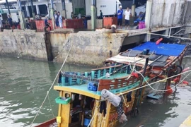 Tàu cá KG 94351 TS do ông Phạm Minh Dũng, thường trú phường 11, thành phố Vũng Tàu làm chủ phương tiện, đang neo đậu tại khu vực cầu Cảng cá Cát Lở. (Ảnh: TTXVN phát)