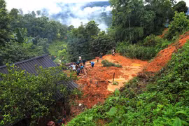 Toàn cảnh nơi ngôi nhà bị sạt lở ở xã Ngàm Đăng Vài, huyện Hoàng Su Phì khiến 4 người thương vong. (Ảnh: TTXVN phát)