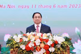 Thủ tướng Phạm Minh Chính phát biểu tại Hội nghị biểu dương, tôn vinh điển hình tiên tiến toàn quốc. (Ảnh: Dương Giang/TTXVN)