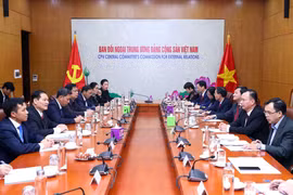 Việt Nam và Lào trao đổi kinh nghiệm về công tác dân vận