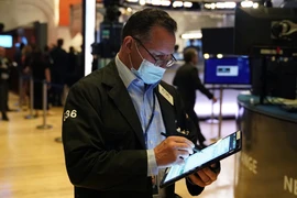 Chứng khoán Mỹ kết thúc tuần giao dịch nhiều biến động trong nốt trầm