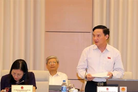 Chủ nhiệm Ủy ban Pháp luật của Quốc hội Nguyễn Khắc Định phát biểu. (Ảnh: Trọng Đức/TTXVN)