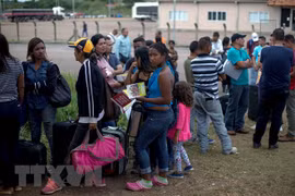 Người di cư Venezuela tại thị trấn Pacaraima, bang Roraima, Brazil ngày 28/2. (Nguồn: AFP/TTXVN)