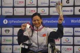 Trịnh Thị Bích Như nhận Huy chương Bạc. (Ảnh: Việt Hùng/Vietnam+)