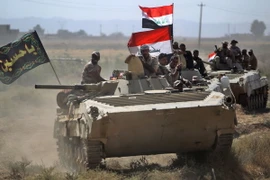 Binh sỹ Iraq sau khi giành quyền kiểm soát thành phố Hawija từ tay IS. (Nguồn: AFP/TTXVN)