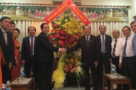 Ông Trần Thanh Mẫn, Chủ tịch Ủy ban Trung ương MTTQ Việt Nam đến thăm, chúc mừng một số cơ sở tôn giáo tại Thành phố Hồ Chí Minh. (Ảnh: Thu Hoài/TTXVN)