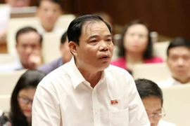 Bộ trưởng Bộ Nông nghiệp và Phát triển Nông thôn Nguyễn Xuân Cường, đại biểu Quốc hội tỉnh Bắc Kạn phát biểu. (Ảnh: Văn Điệp/ TTXVN)