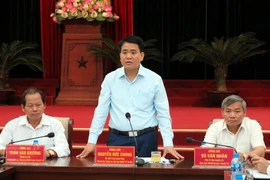 Chủ tịch Ủy ban Nhân dân thành phố Hà Nội Nguyễn Đức Chung phát biểu kết luận tại cuộc làm việc với huyện Thanh Trì. (Ảnh: Nguyễn Văn Cảnh/TTXVN)