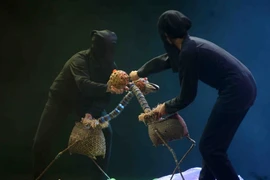 Một cảnh trong vở rối 'Âm thanh của nhà tôi' của Đoàn múa rối Cộng hòa Dân chủ Nhân dân Lào tham dự liên hoan. (Ảnh: Thanh Tùng/TTXVN)