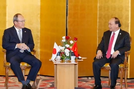 Thủ tướng Nguyễn Xuân Phúc tiếp Chủ tịch kiêm Tổng Giám đốc điều hành Công ty Mitsubishi. (Ảnh: Thống Nhất/TTXVN)