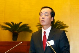 Bộ trưởng Bộ Xây dựng Phạm Hồng Hà, thừa ủy quyền của Thủ tướng Chính phủ trình bày Tờ trình về dự án Luật Kiến trúc. (Ảnh: Doãn Tấn/TTXVN)