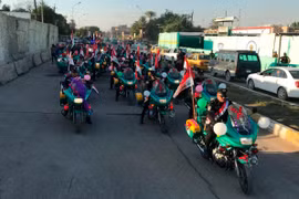 Lực lượng an ninh Iraq diễu hành nhân kỷ niệm 1 năm ngày chiến thắng IS. (Nguồn: AP)