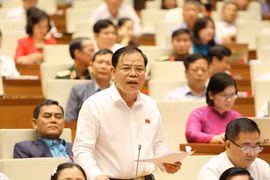  Bộ trưởng Bộ Nông nghiệp và Phát triển nông thôn Nguyễn Xuân Cường, Đại biểu Quốc hội tỉnh Bắc Kạn phát biểu. (Ảnh: Phương Hoa/TTXVN)