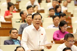  Bộ trưởng Bộ Nông nghiệp và Phát triển nông thôn Nguyễn Xuân Cường, Đại biểu Quốc hội tỉnh Bắc Kạn phát biểu. (Ảnh: Phương Hoa/TTXVN)