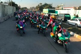 Lực lượng an ninh Iraq diễu hành nhân kỷ niệm 1 năm ngày chiến thắng IS. (Nguồn: AP)