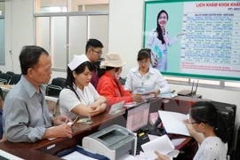 Bệnh nhân khám dịch vụ tại bệnh viện Quận 2, Thành phố Hồ Chí Minh. (Ảnh: Phương Vy/TTXVN)