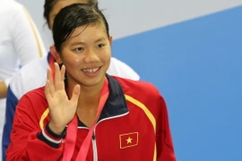 Nguyễn Thị Ánh Viên lập kỷ lục mới ở nội dung bơi bướm 200m nữ. (Ảnh: Quốc Khánh/Singapore)