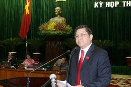 Chủ nhiệm Ủy ban Kinh tế của Quốc hội Nguyễn Văn Giàu trình bày Báo cáo của Ủy ban Thường vụ Quốc hội về kết quả giám sát. (Ảnh: Thống Nhất/TTXVN)