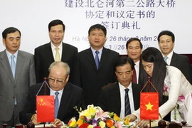 Quang cảnh lễ ký kết. (Ảnh: Thế Duyệt/TTXVN)