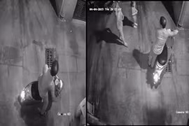 Hình ảnh người đàn ông và hai cháu bé được camera ghi lại (Ảnh cắt từ Clip) 