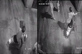 Hình ảnh người đàn ông và hai cháu bé được camera ghi lại (Ảnh cắt từ Clip) 