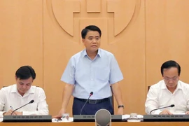 Chủ tịch Ủy ban nhân dân thành phố Hà Nội Nguyễn Đức Chung tại cuộc họp chiều 5/9. (Ảnh: PV/Vietnam+) 