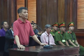 Bị cáo Nguyen Michael Phuong Minh tại phiên tòa. (Ảnh: TTXVN)