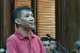 Bị cáo Nguyen Michael Phuong Minh bị tuyên án 12 năm tù về tội 'Hoạt động nhằm lật đổ chính quyền nhân dân.' (Ảnh: Thành Chung/TTXVN)