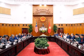 Thủ tướng Nguyễn Xuân Phúc hội đàm với Thủ tướng Malaysia Mahathir Mohamad. (Ảnh: Thống Nhất/TTXVN)