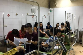 Cơ quan chức năng đang lấy thông tin để điều tra nguyên nhân vụ việc. (Ảnh: Mạnh Tú/TTXVN)