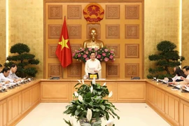 Phó Thủ tướng Vương Đình Huệ, Trưởng Ban Chỉ đạo điều hành giá chủ trì cuộc họp. (Ảnh: Văn Điệp/TTXVN)