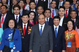 Thủ tướng Nguyễn Xuân Phúc và các đại biểu. (Ảnh: Thống Nhất/TTXVN)