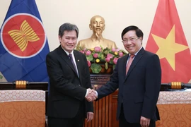 Phó Thủ tướng, Bộ trưởng Ngoại giao Phạm Bình Minh tiếp Tổng Thư ký ASEAN Lim Jock Hoi. (Ảnh: Lâm Khánh/TTXVN)