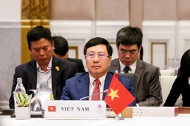 Phó Thủ tướng, Bộ trưởng Ngoại giao Phạm Bình Minh dự Hội nghị AMM. (Ảnh: Ngọc Quang/TTXVN)