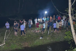 Hiện trường nơi phát hiện thi thể. (Ảnh: Xuân Tư/TTXVN)