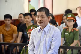 Bị cáo Lê Quốc Bình tại phiên tòa xét xử sơ thẩm. (Ảnh: Nguyên Linh/TTXVN)