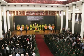 Toàn cảnh lễ truy điệu và đưa tang đồng chí Đồng Sỹ Nguyên. (Ảnh: Văn Điệp/TTXVN)
