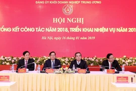 Trưởng Ban Kinh tế Trung ương Nguyễn Văn Bình và các đồng chí lãnh đạo Đảng ủy Khối Doanh nghiệp Trung ương chủ trì hội nghị. (Ảnh: Văn Điệp/TTXVN)