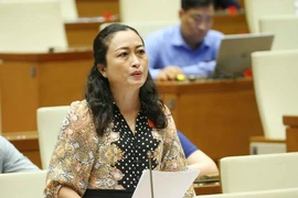 Đại biểu Quốc hội tỉnh Bạc Liêu Trần Thị Hoa Ry phát biểu ý kiến. (Ảnh: Doãn Tấn/TTXVN)