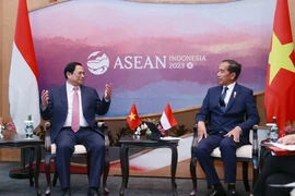 Thủ tướng Phạm Minh Chính gặp Tổng thống Indonesia Yoko Widodo nhân dịp sang dự Hội nghị Cấp cao ASEAN lần thứ 42 tại Labuan Bajo, Indonesia. (Ảnh Dương Giang: TTXVN)