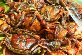 Ba khía rang me. (Ảnh: Thông Hải/Báo ảnh Việt Nam)