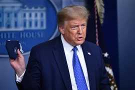 Tổng thống Mỹ Donald Trump phát biểu trong cuộc họp báo về chống dịch COVID-19, tại Nhà Trắng, Washington, DC., Mỹ, ngày 22/7/2020. (Ảnh: AFP/TTXVN)